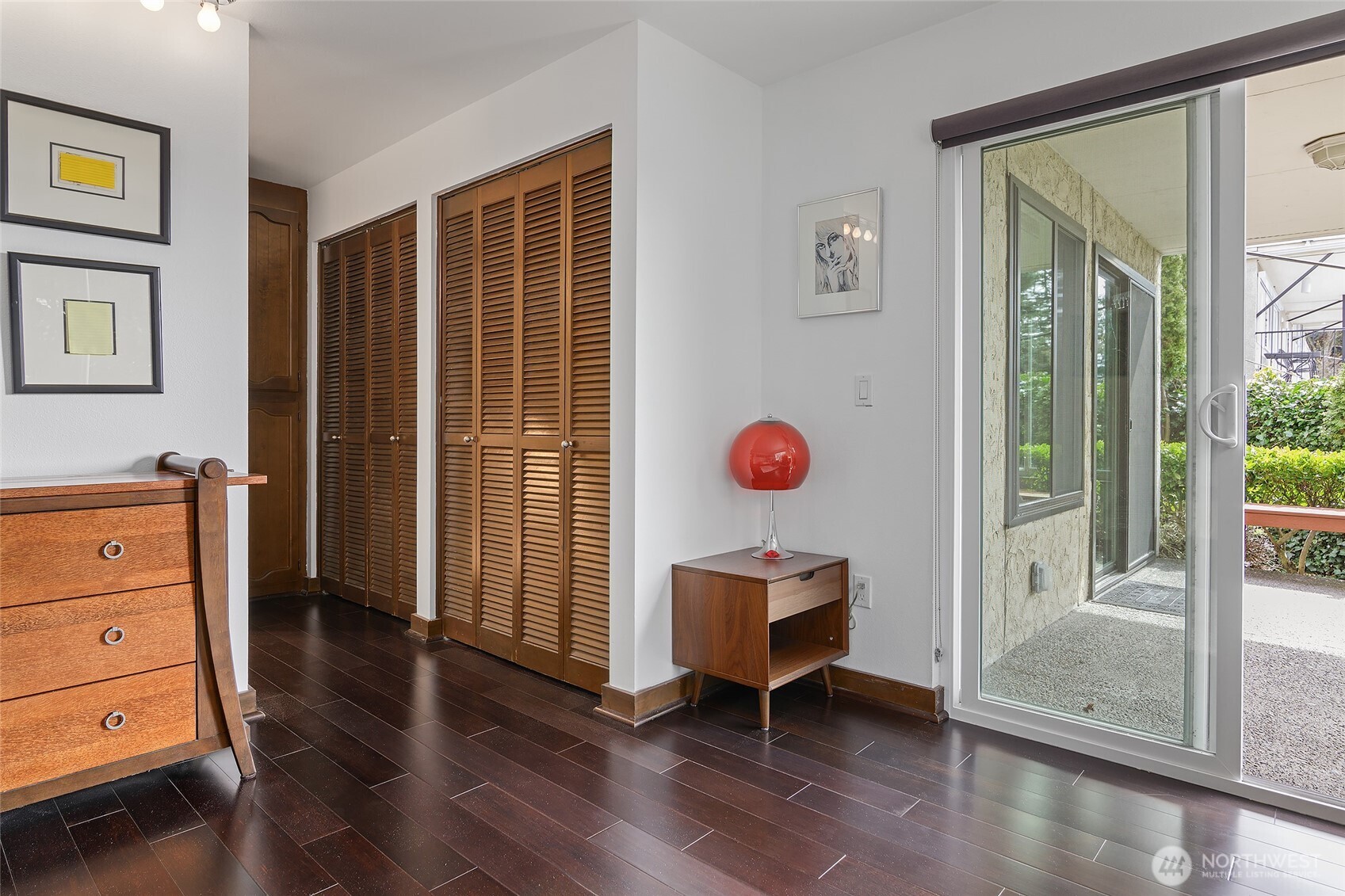 135 North 46th Street, Unit 101 Seattle, WA 98103 - Photo 11 of 30 a view of room with furniture and wooden floor