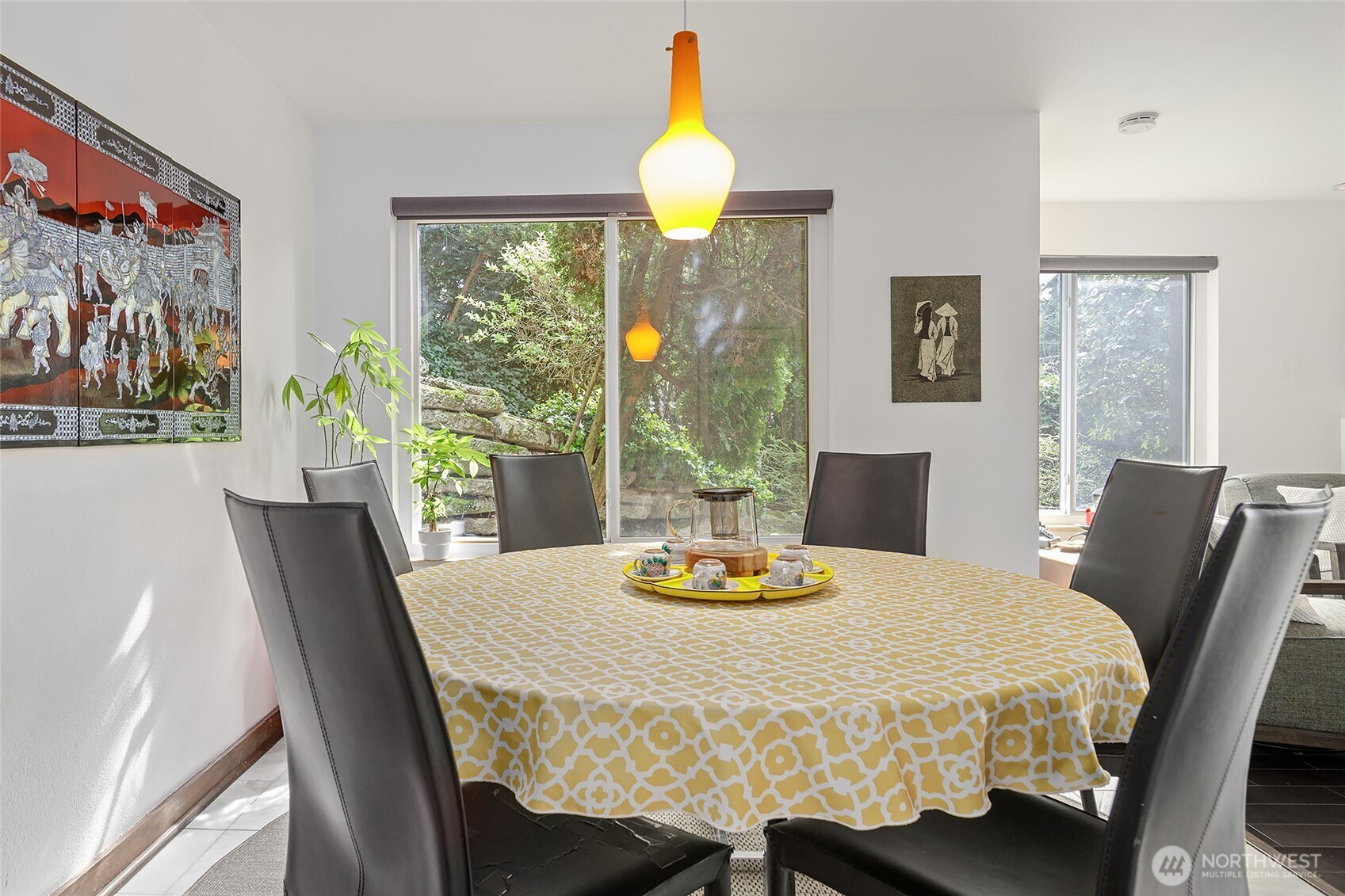 135 North 46th Street, Unit 101 Seattle, WA 98103 - Photo 19 of 30 a bedroom with a bed and a table