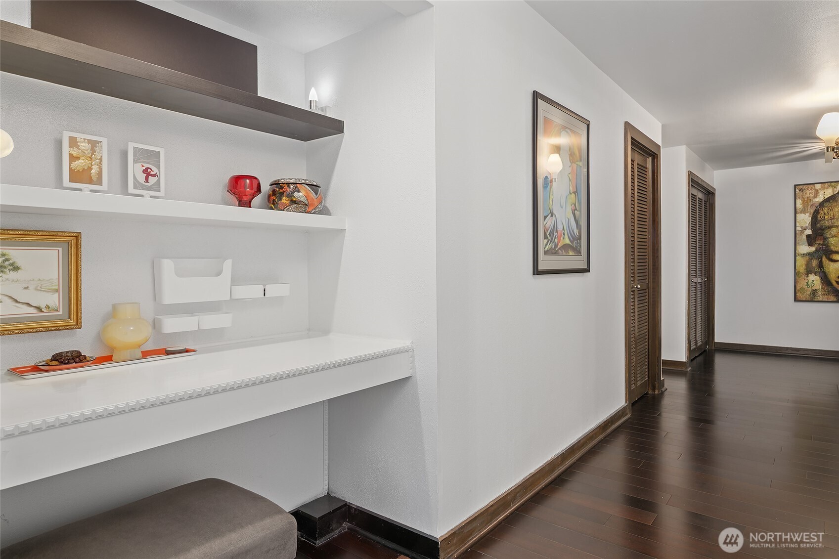 135 North 46th Street, Unit 101 Seattle, WA 98103 - Photo 20 of 30 a room with furniture and wooden floor