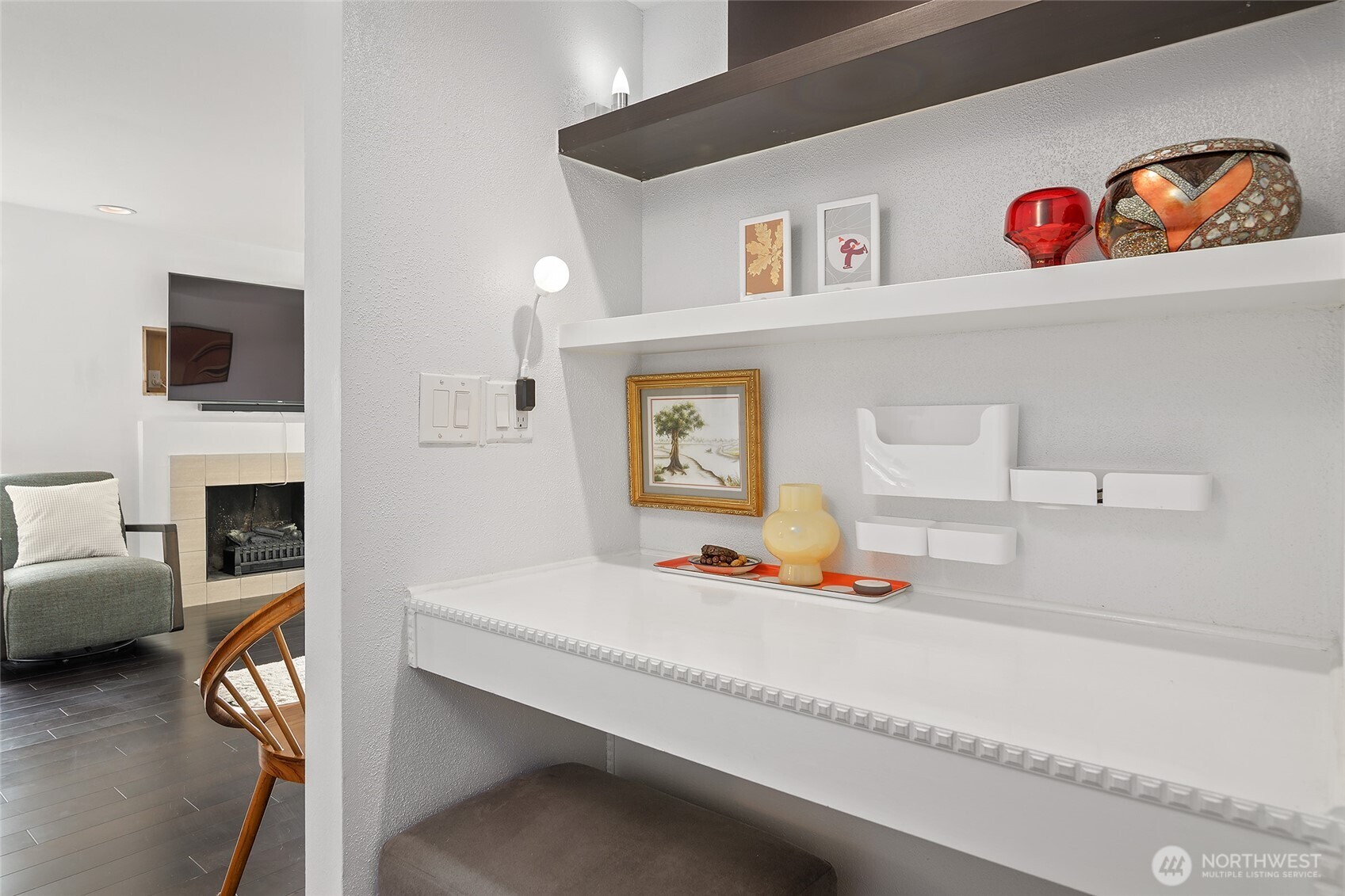 135 North 46th Street, Unit 101 Seattle, WA 98103 - Photo 21 of 30 a outdoor living space with furniture and a fireplace