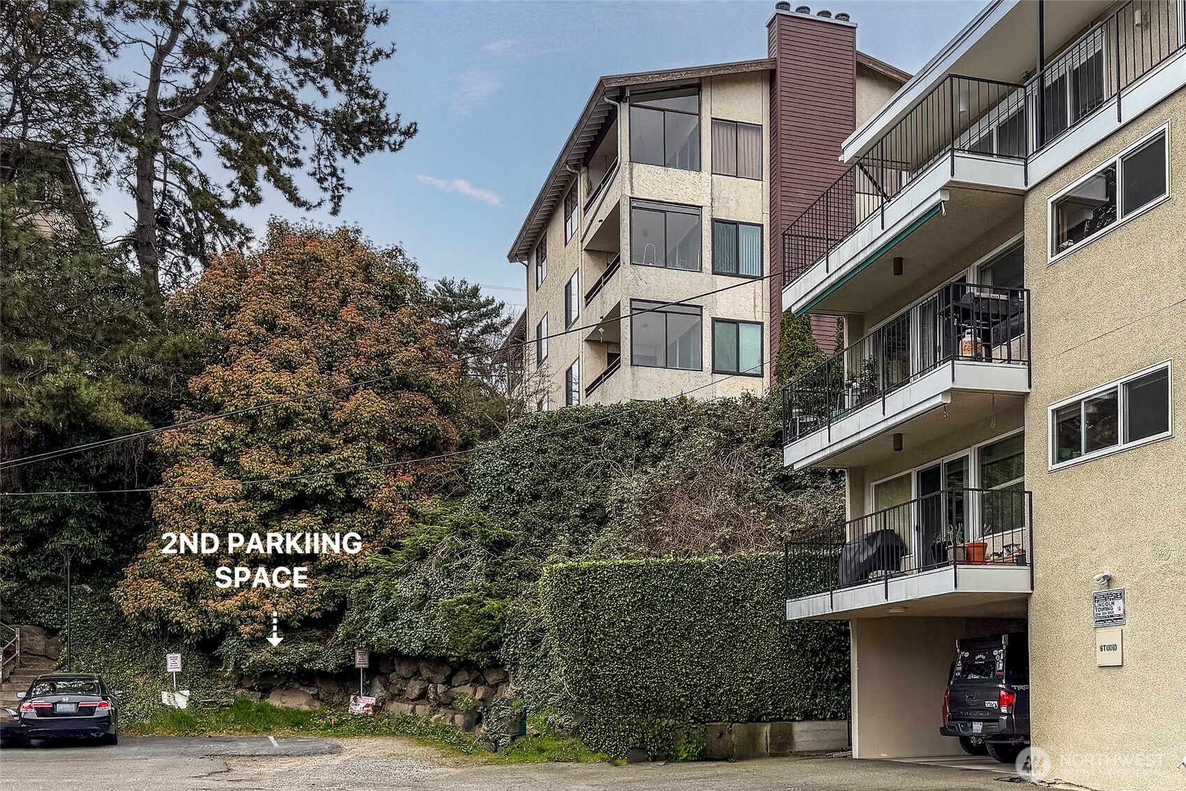 135 North 46th Street, Unit 101 Seattle, WA 98103 - Photo 25 of 30 a view of multiple houses with a street