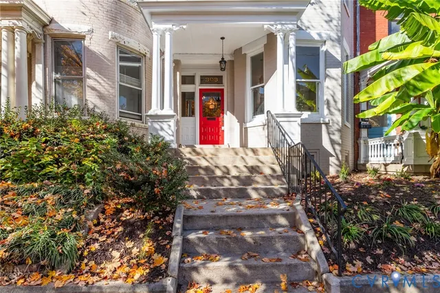 a view of a building with a tree