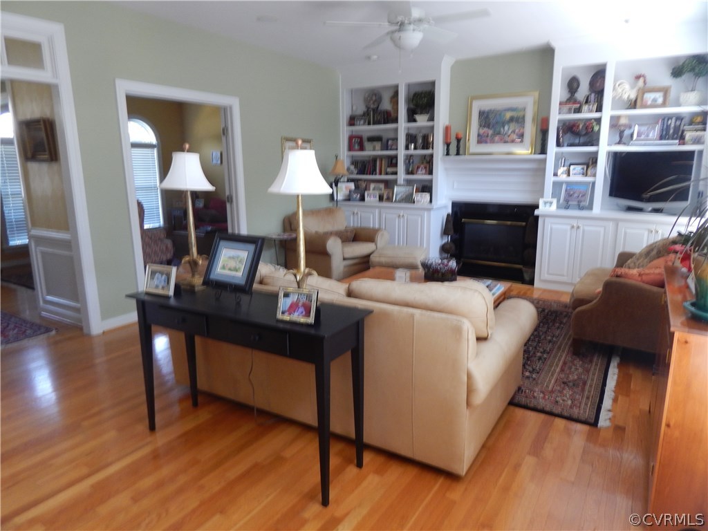 1737 Rolfield Way Henrico, VA 23238 - Photo 11 of 16 a living room with furniture and a fireplace