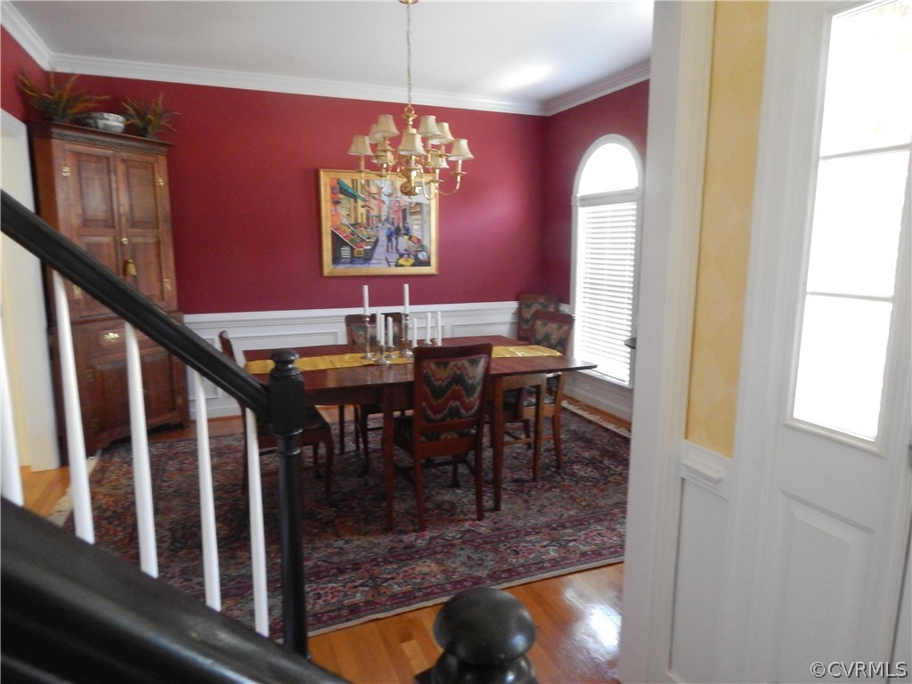 1737 Rolfield Way Henrico, VA 23238 - Photo 12 of 16 a view of a dining room with furniture window and wooden floor