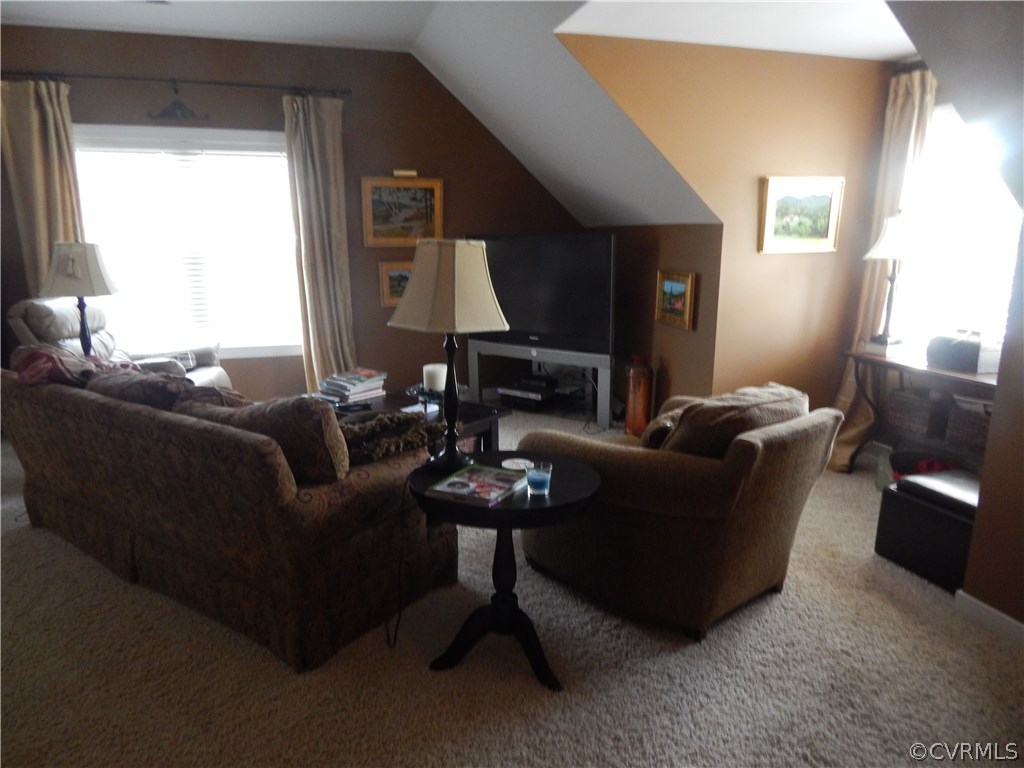 1737 Rolfield Way Henrico, VA 23238 - Photo 14 of 16 a living room with furniture and a fireplace