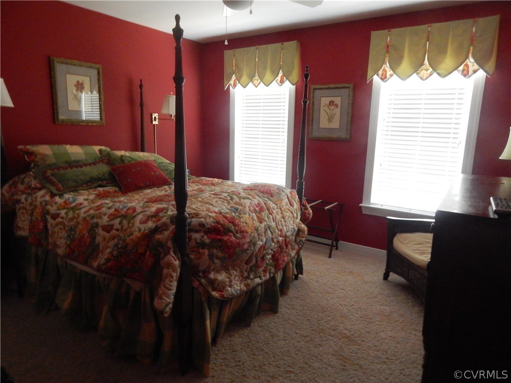 1737 Rolfield Way Henrico, VA 23238 - Photo 15 of 16 a bedroom with a bed and a window