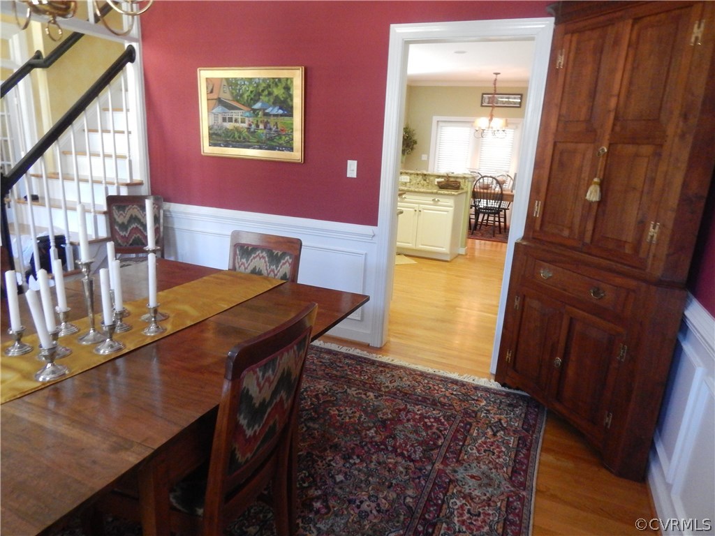 1737 Rolfield Way Henrico, VA 23238 - Photo 5 of 16 a dining room with furniture and wooden floor
