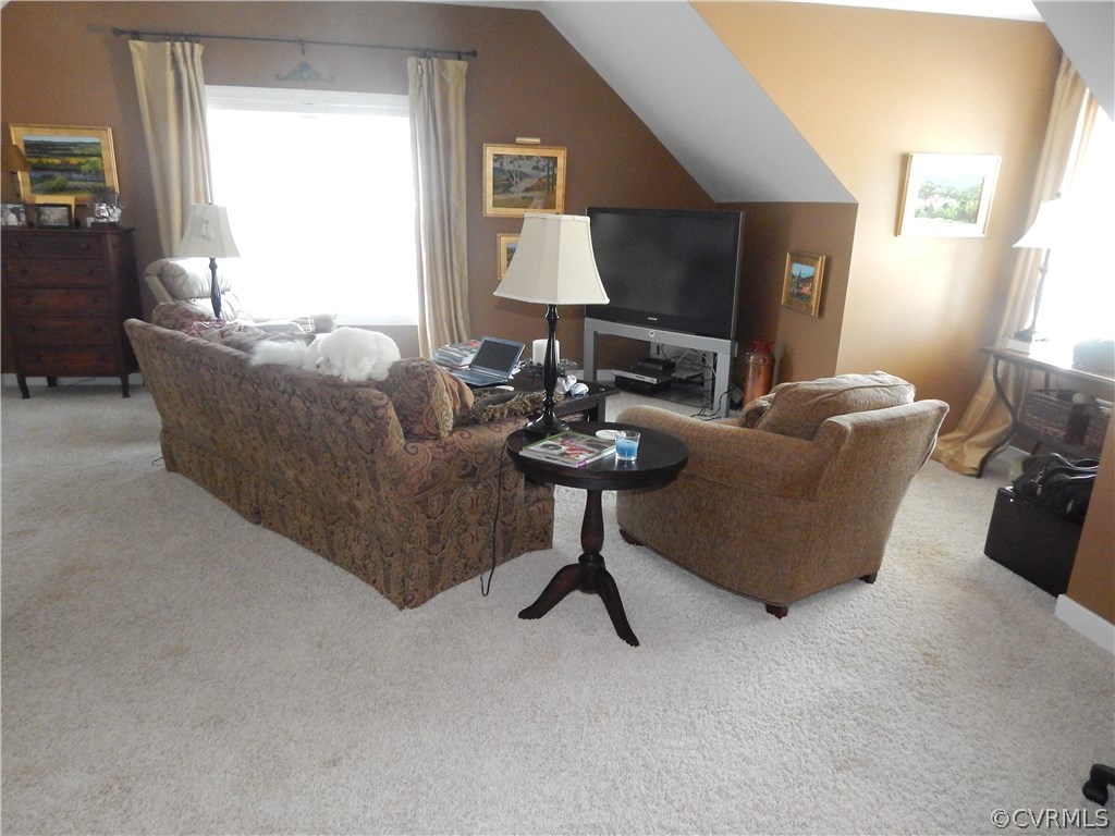 1737 Rolfield Way Henrico, VA 23238 - Photo 6 of 16 a living room with furniture and a fireplace