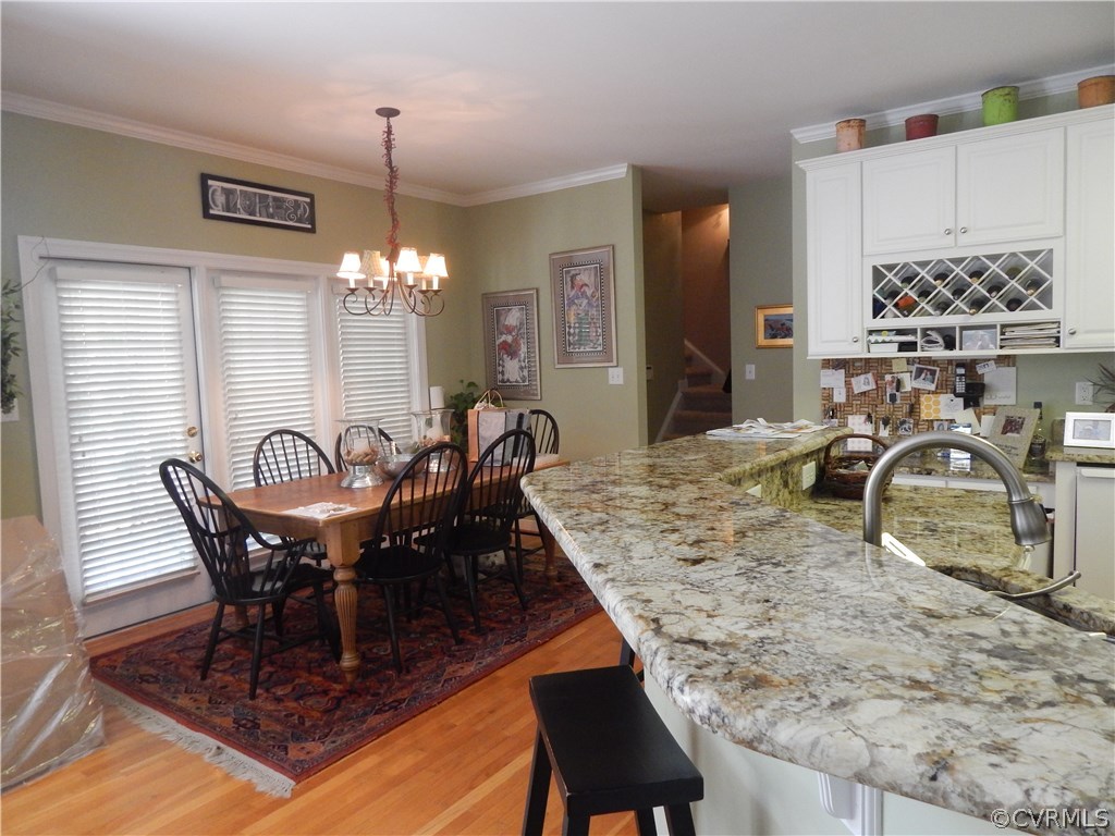1737 Rolfield Way Henrico, VA 23238 - Photo 10 of 16 a view of a dining room with furniture