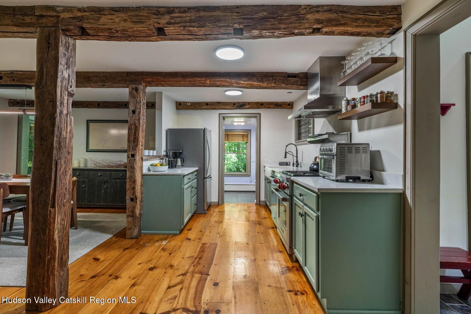 125 Johnson Hill Road Kingston, NY 12401 - Photo 11 of 34 Kitchen with Island and Beamed Ceiling