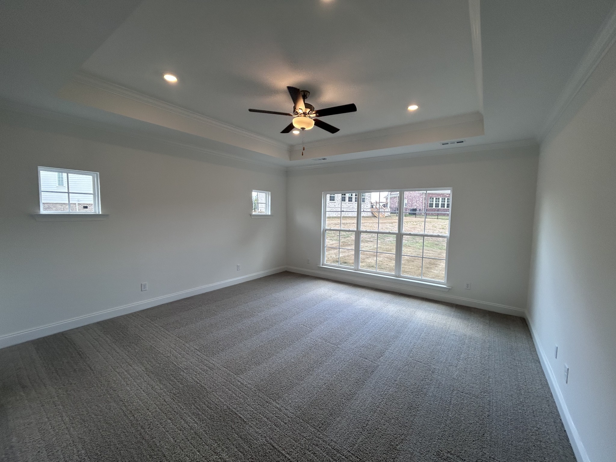 6158 Worthington Road Columbia, TN 38401 - Photo 28 of 48 an empty room with chandelier fan and windows