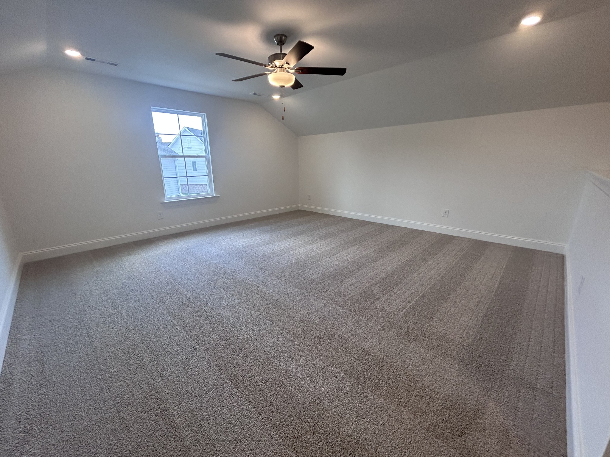 6158 Worthington Road Columbia, TN 38401 - Photo 34 of 48 an empty room with windows and ceiling fan view