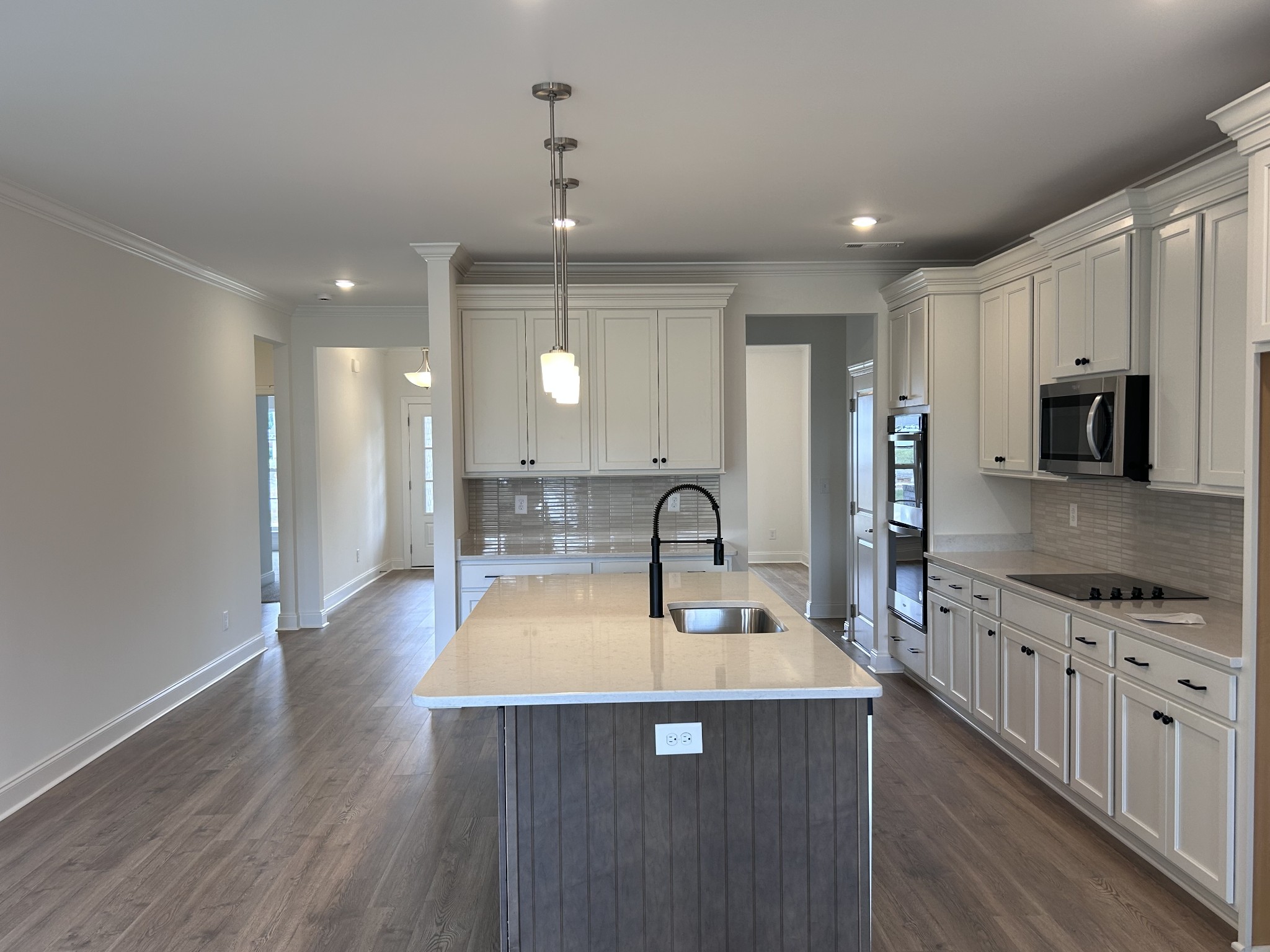 6158 Worthington Road Columbia, TN 38401 - Photo 40 of 48 a kitchen with stainless steel appliances a sink stove and wooden floor
