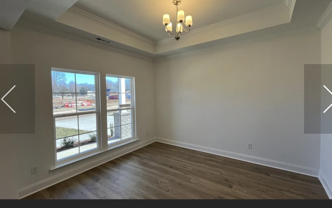 6158 Worthington Road Columbia, TN 38401 - Photo 10 of 48 a view of an empty room with wooden floor and a window