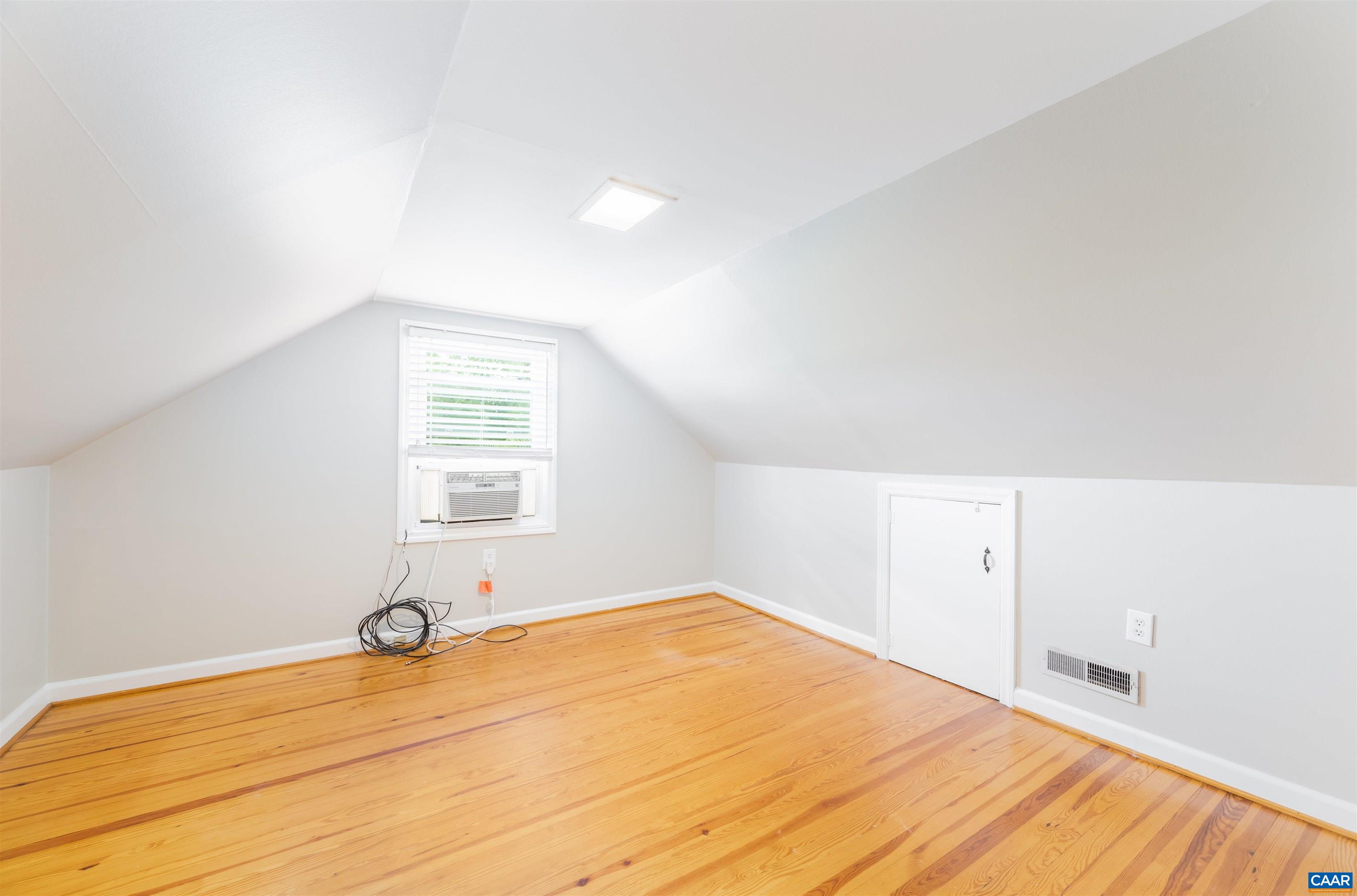 103 Perry Drive Charlottesville, VA 22902 - Photo 20 of 37 a view of a room with a window and wooden floor