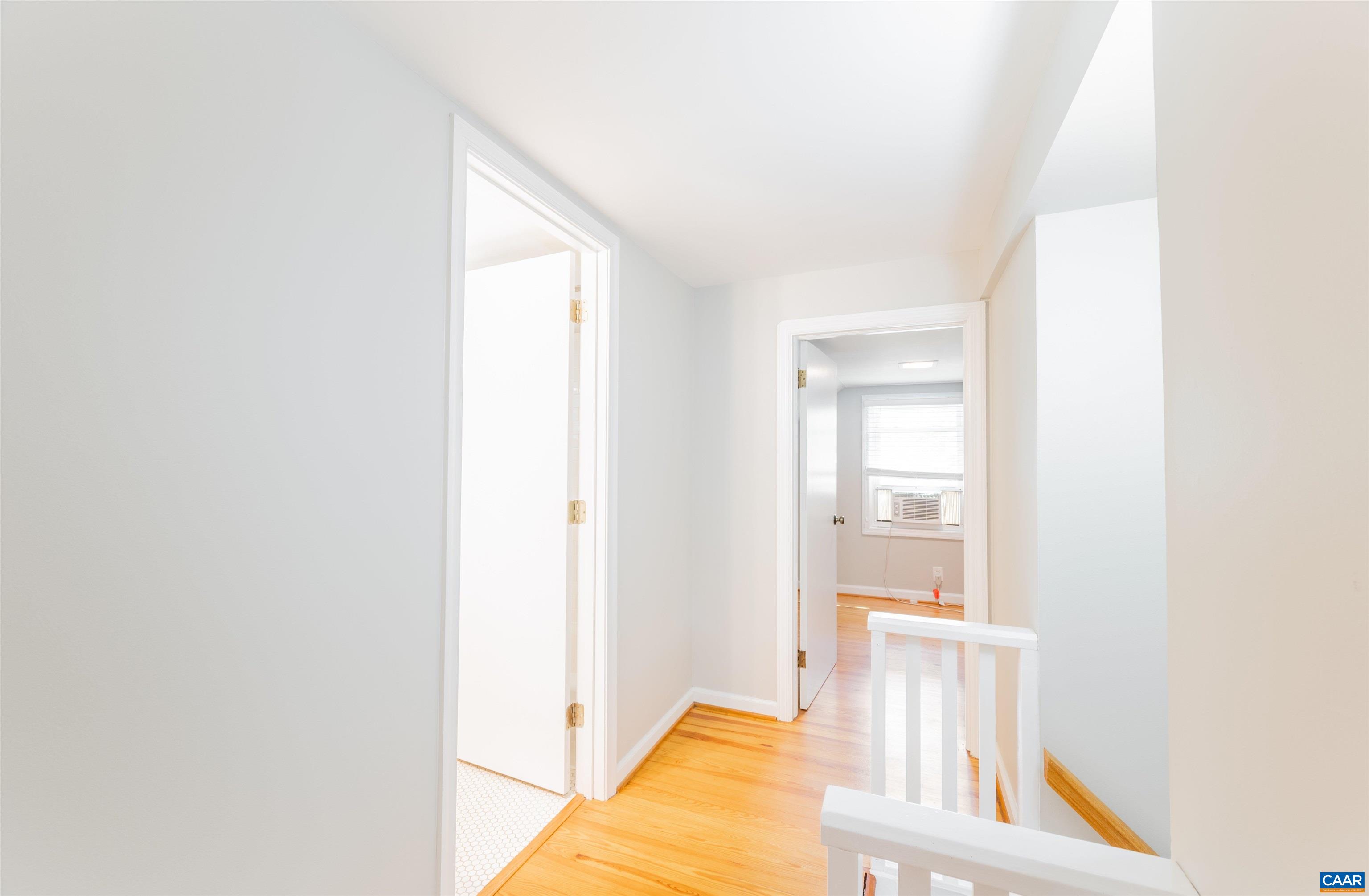 103 Perry Drive Charlottesville, VA 22902 - Photo 21 of 37 a living room with a bed and next to a window