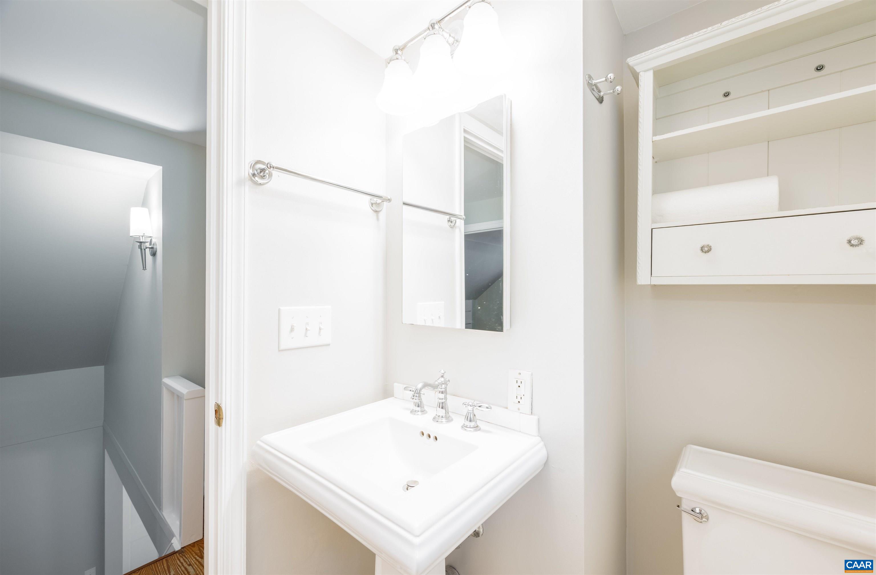103 Perry Drive Charlottesville, VA 22902 - Photo 23 of 37 a bathroom with a sink a toilet and shower