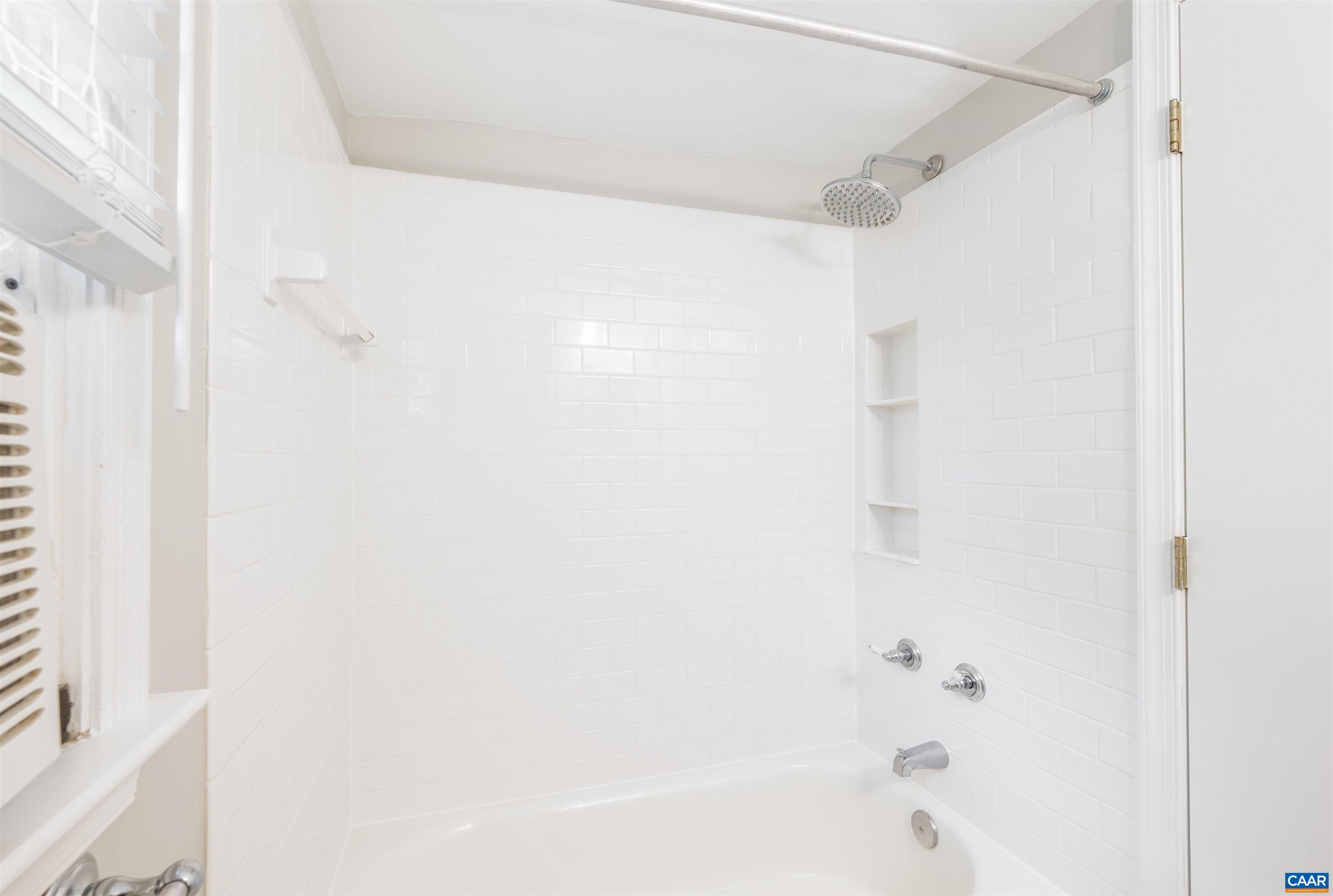 103 Perry Drive Charlottesville, VA 22902 - Photo 24 of 37 a bathroom with a bathtub