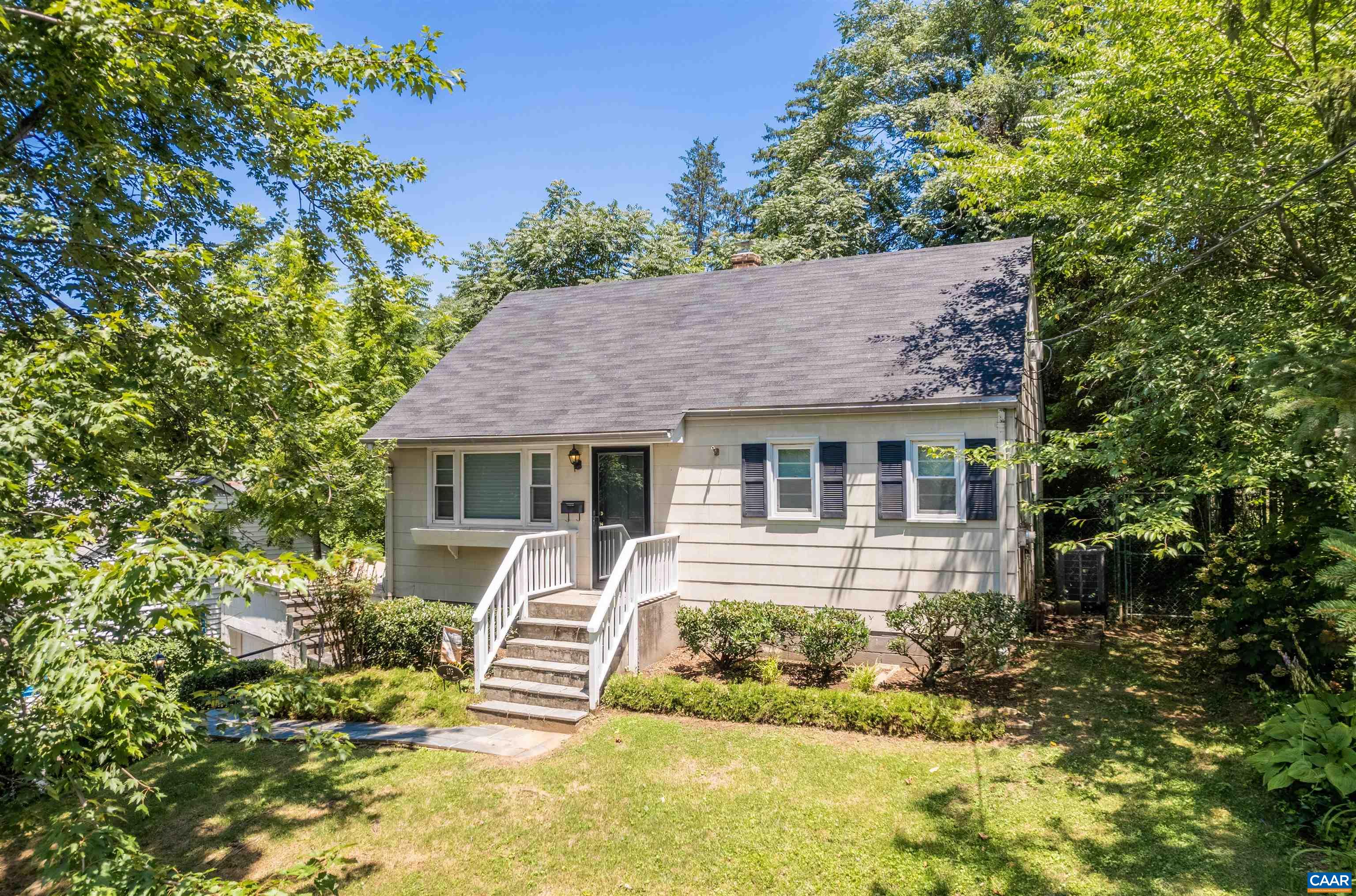 103 Perry Drive Charlottesville, VA 22902 - Photo 28 of 37 a front view of house with yard and green space
