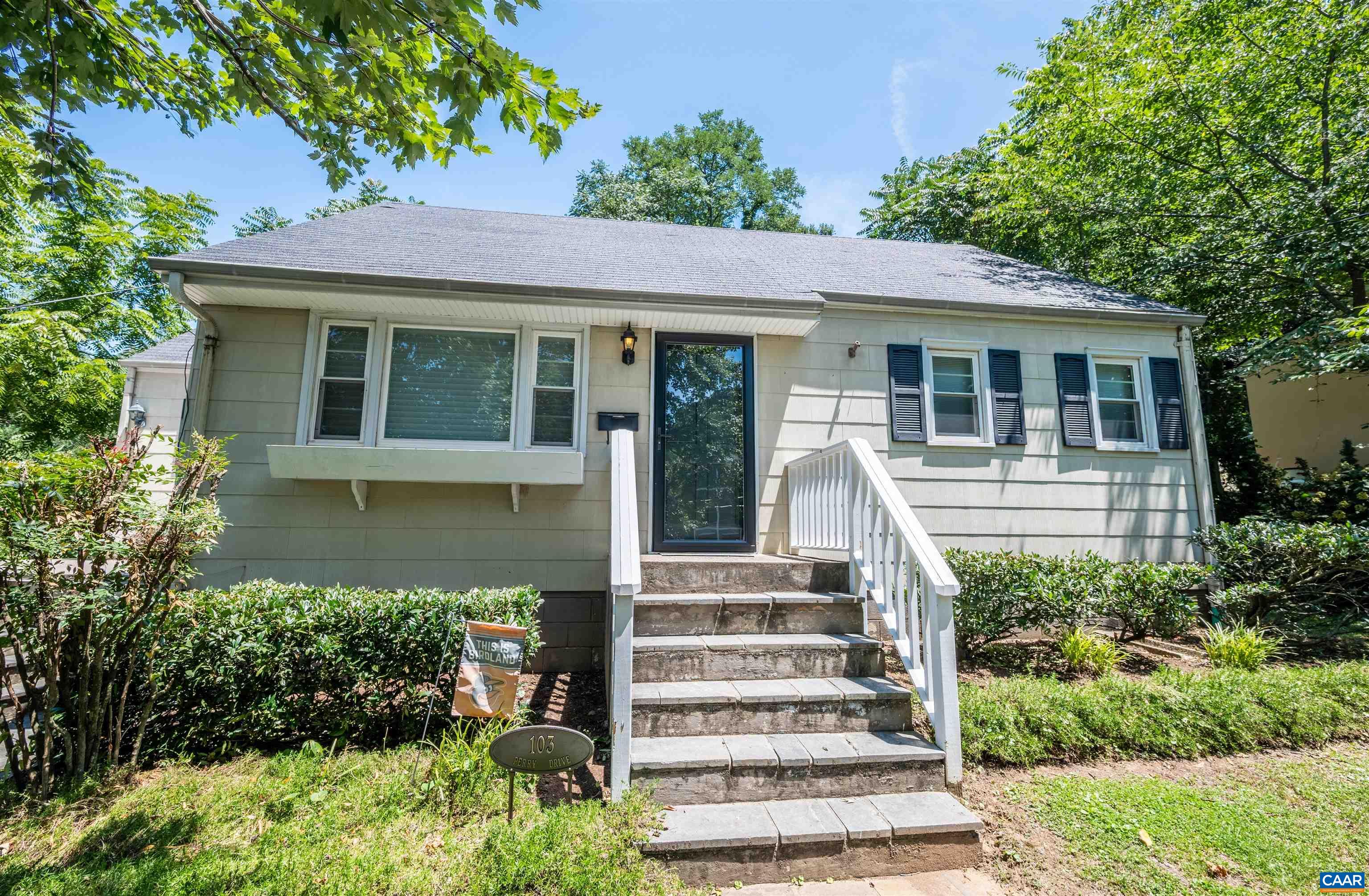 103 Perry Drive Charlottesville, VA 22902 - Photo 31 of 37 a front view of a house with a garden