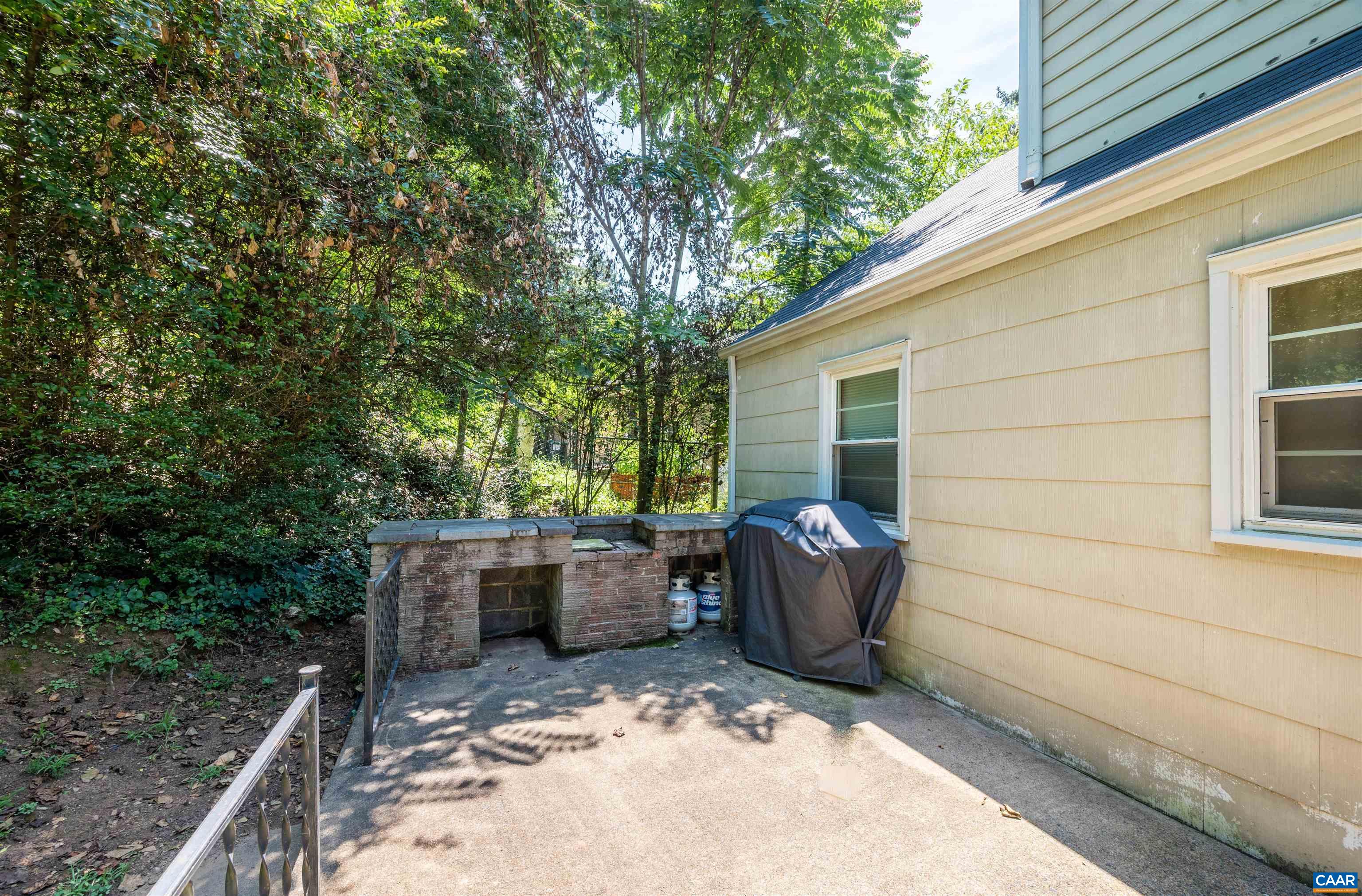 103 Perry Drive Charlottesville, VA 22902 - Photo 35 of 37 a view of backyard with outdoor seating and plants