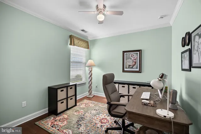 a view of a workspace with furniture