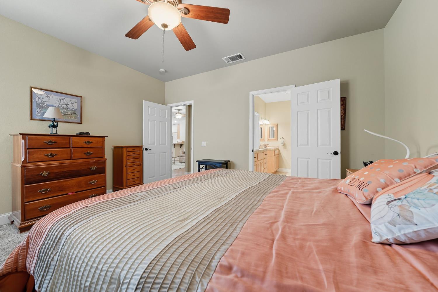 3109 Dunn Road Valley Springs, CA 95252 - Photo 38 of 62 a bedroom with a bed and a chandelier
