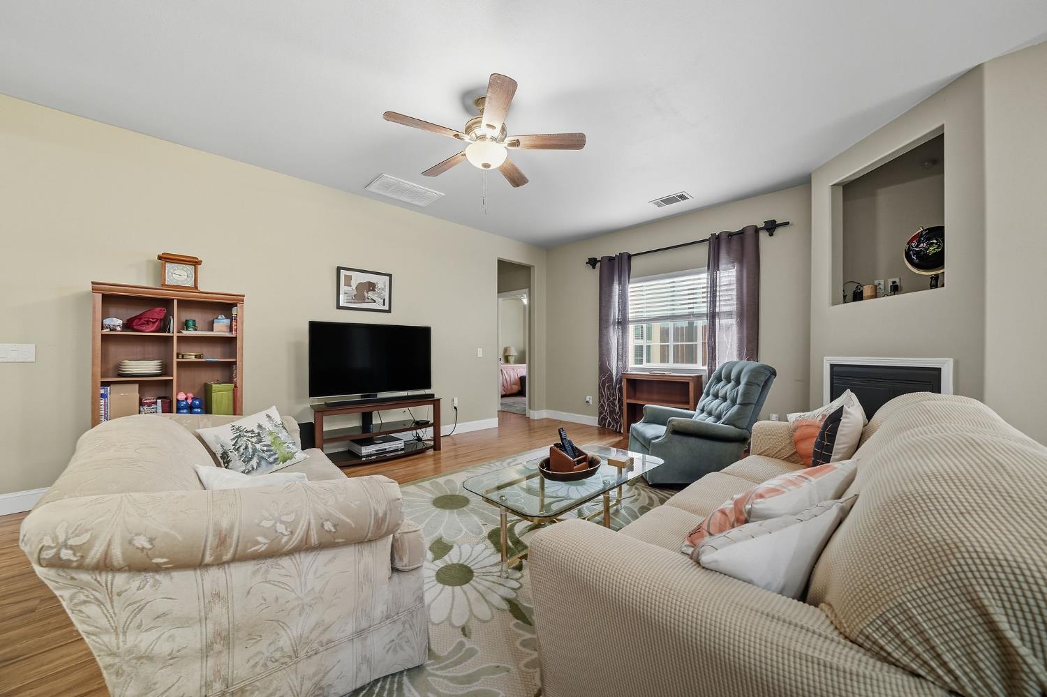 3109 Dunn Road Valley Springs, CA 95252 - Photo 46 of 62 a living room with furniture and a flat screen tv