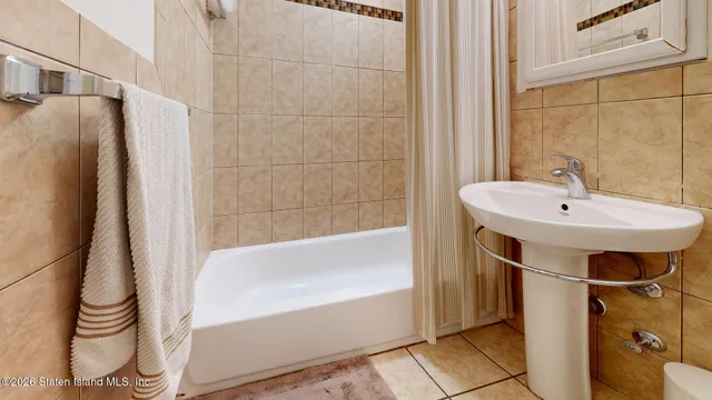 a bathroom with a sink and a bathtub