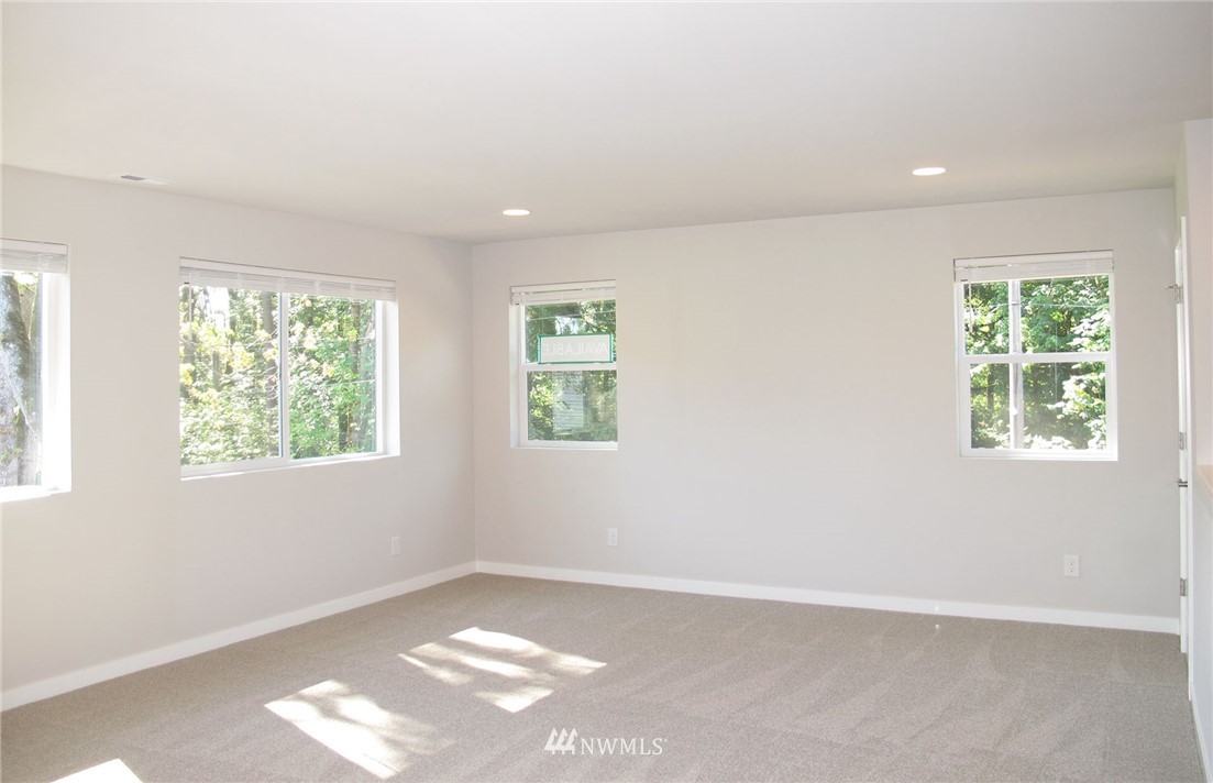 109 215th Street Southeast, Unit 5 Bothell, WA 98021 - Photo 7 of 12 a view of an empty room with a window