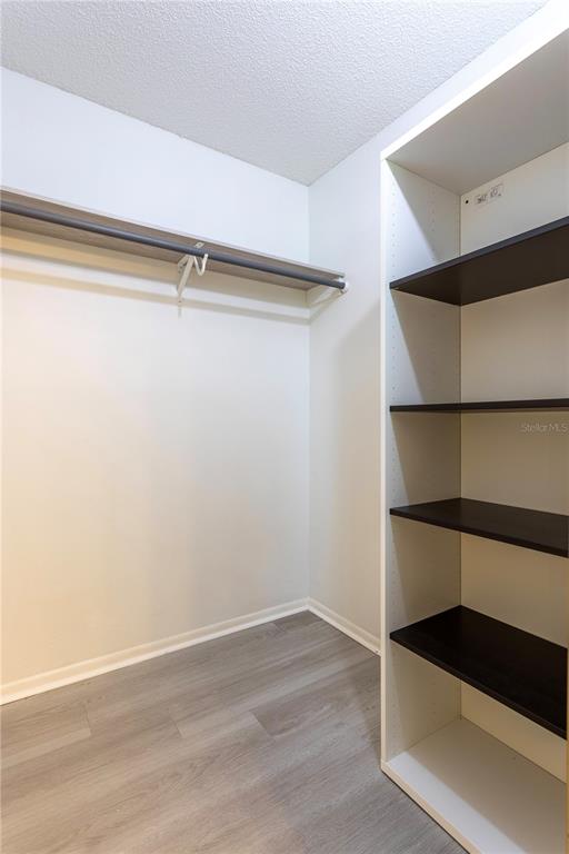 4428 Middlebrook Road, Unit 4 Orlando, FL 32811 - Photo 16 of 28 a view of an empty walk in closet