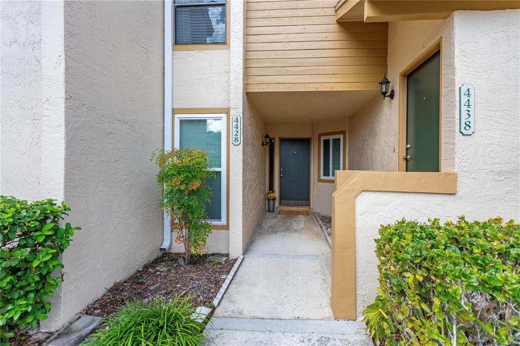 4428 Middlebrook Road, Unit 4 Orlando, FL 32811 - Photo 2 of 28 a view of a entryway door front of house