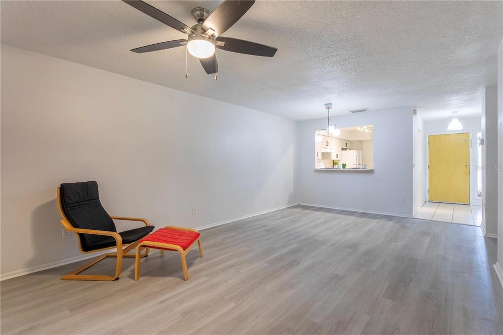 4428 Middlebrook Road, Unit 4 Orlando, FL 32811 - Photo 10 of 28 a view of a workspace with furniture and a window