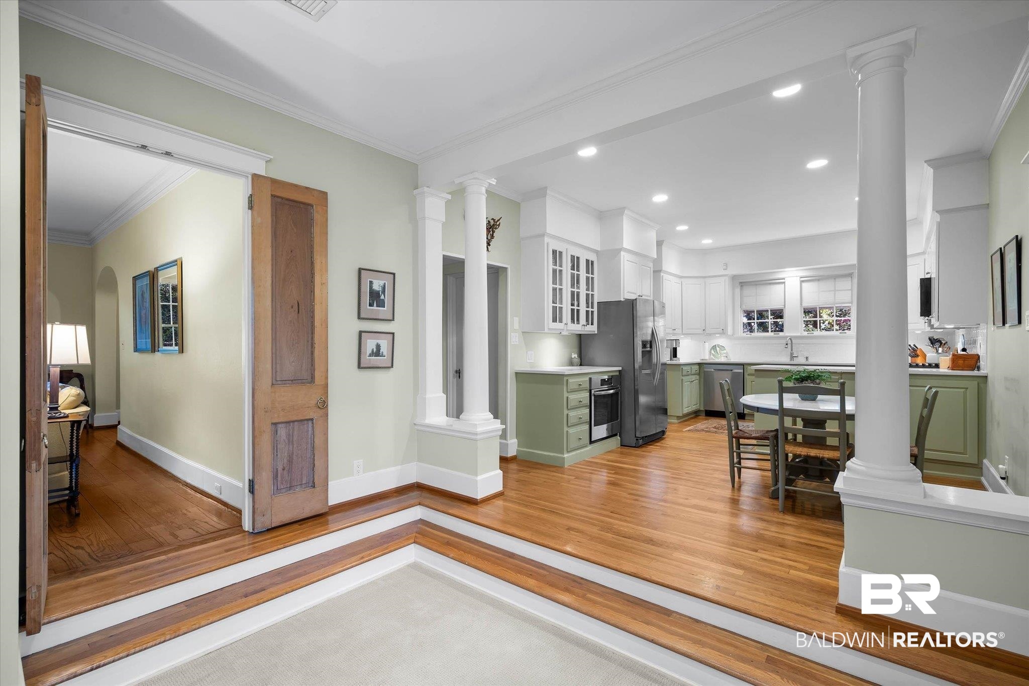 2 Westgate Road Mobile, AL 36608 - Photo 17 of 63 Kitchen area with ornate columns, ornamental molding, light wood-type flooring, and recessed lighting