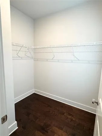 a view of a room with racks on the wall