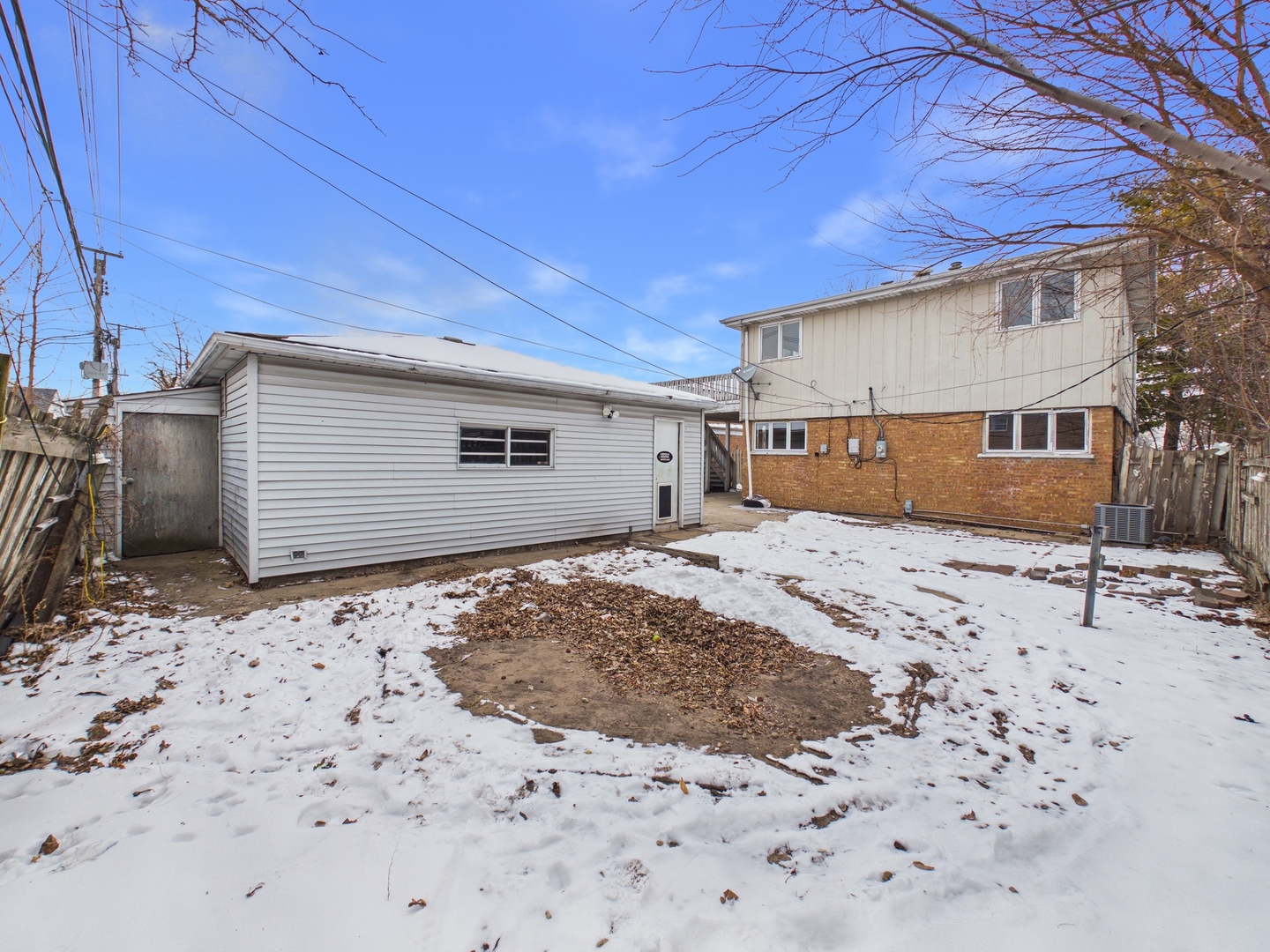 4707 West 82nd Place Chicago, IL 60652 - Photo 21 of 23 a view of a backyard of a house
