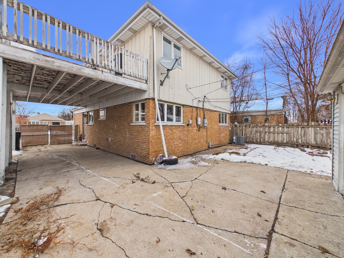 4707 West 82nd Place Chicago, IL 60652 - Photo 22 of 23 a view of a house with a wooden bridge