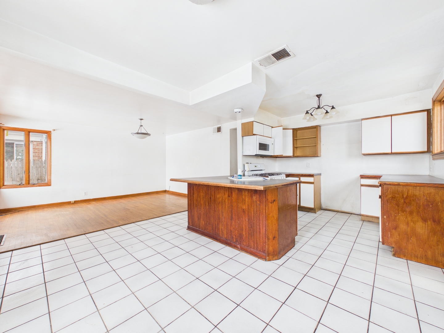 4707 West 82nd Place Chicago, IL 60652 - Photo 5 of 23 a kitchen with stainless steel appliances a cabinets and a counter top space