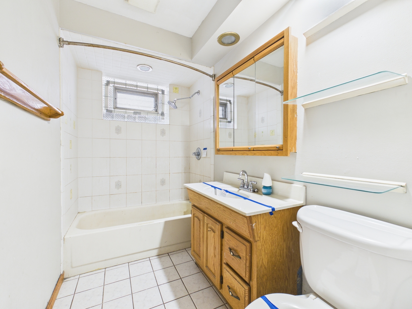 4707 West 82nd Place Chicago, IL 60652 - Photo 10 of 23 a bathroom with a bathtub sink mirror and toilet