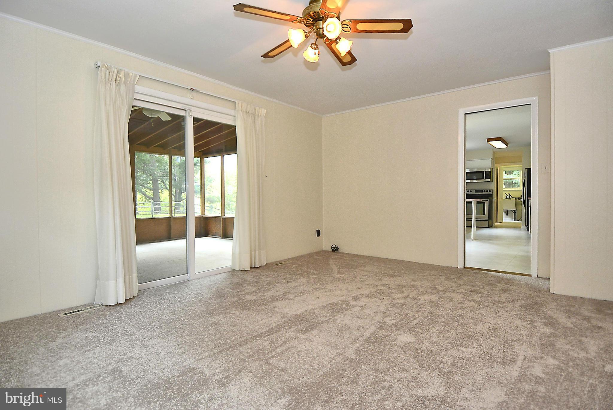 9014 Pittsfield Road Baltimore, MD 21208 - Photo 14 of 30 Family Room with Brand New Carpet