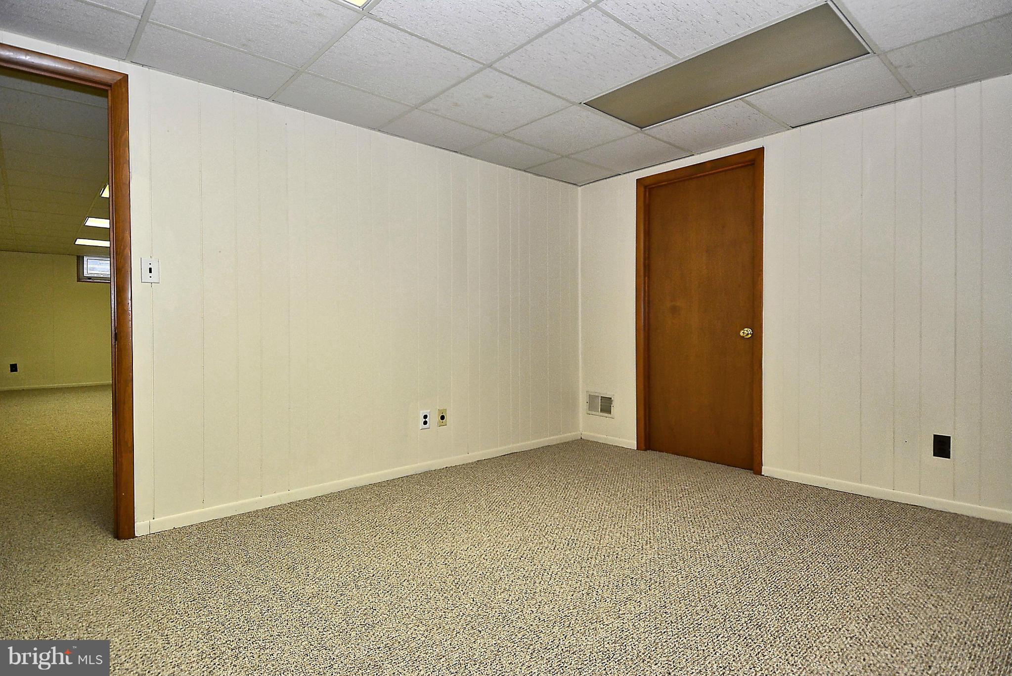 9014 Pittsfield Road Baltimore, MD 21208 - Photo 27 of 30 Playroom on Lower Level with Brand New Carpet