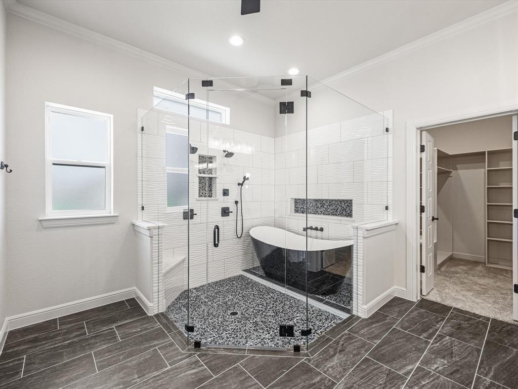 161 Frontera Drive Decatur, TX 76234 - Photo 23 of 40 a bathroom with a double vanity sink mirror and shower