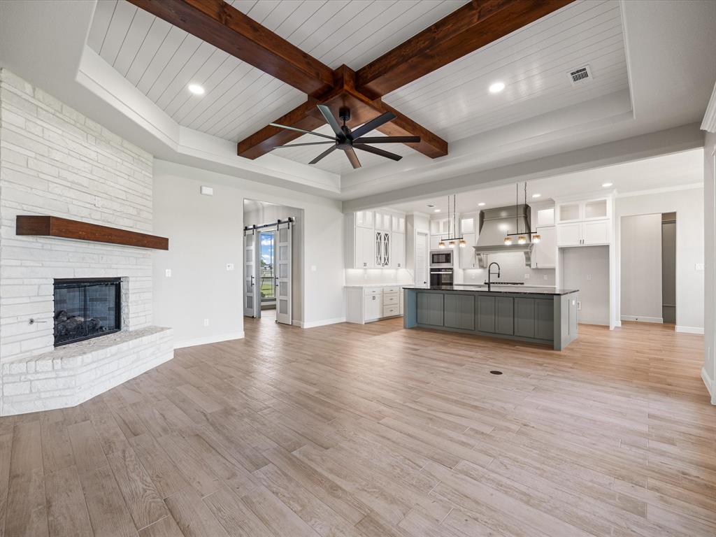 161 Frontera Drive Decatur, TX 76234 - Photo 32 of 40 a view of a kitchen with furniture and wooden floor