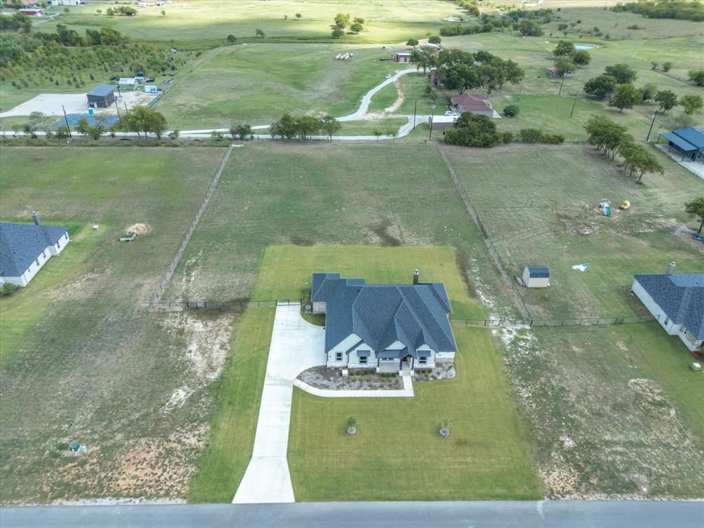 161 Frontera Drive Decatur, TX 76234 - Photo 7 of 40 a view of a lake from a yard
