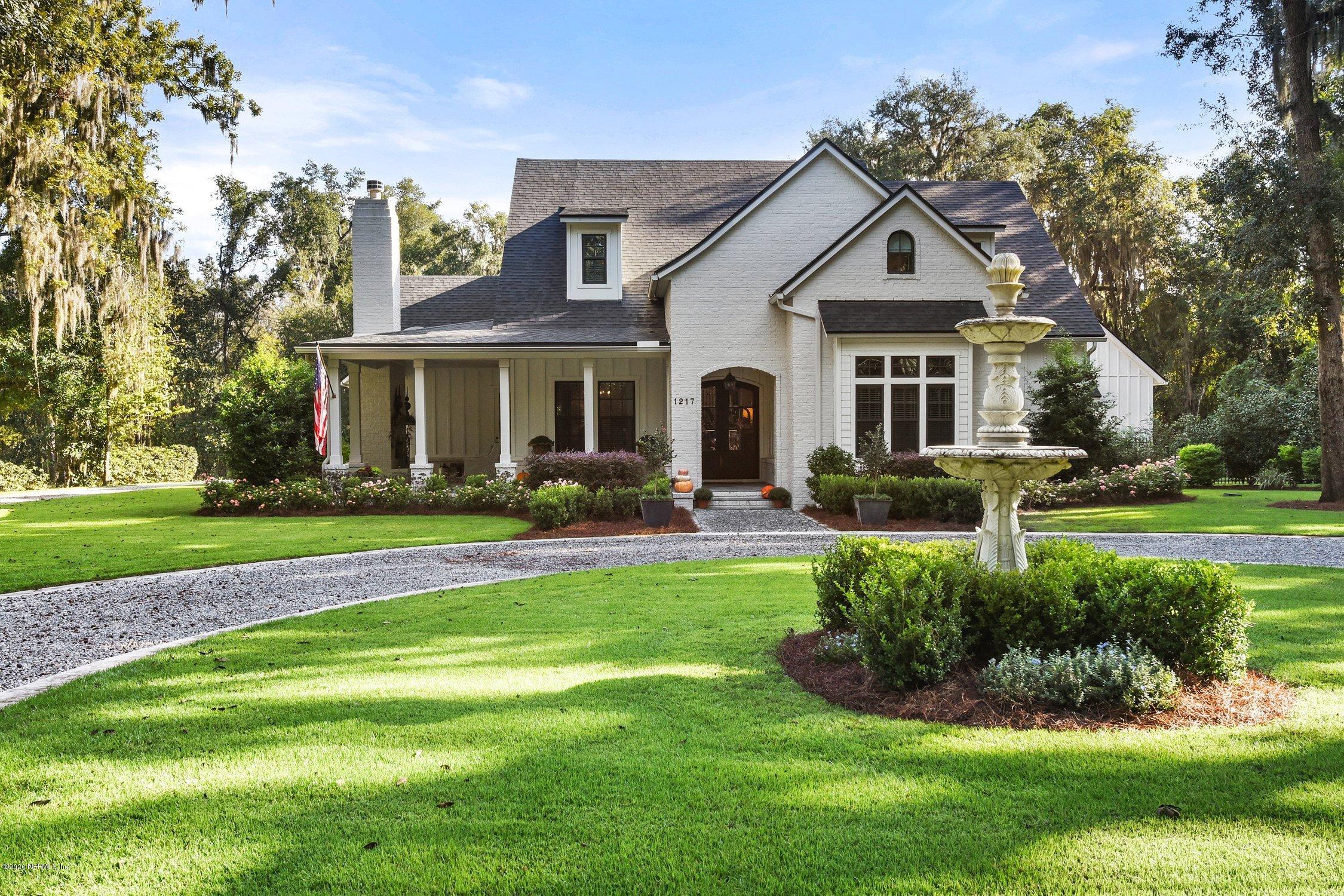 1217 Wedgewood Road Fruit Cove, FL 32259 - Photo 1 of 69 a front view of a house with a yard