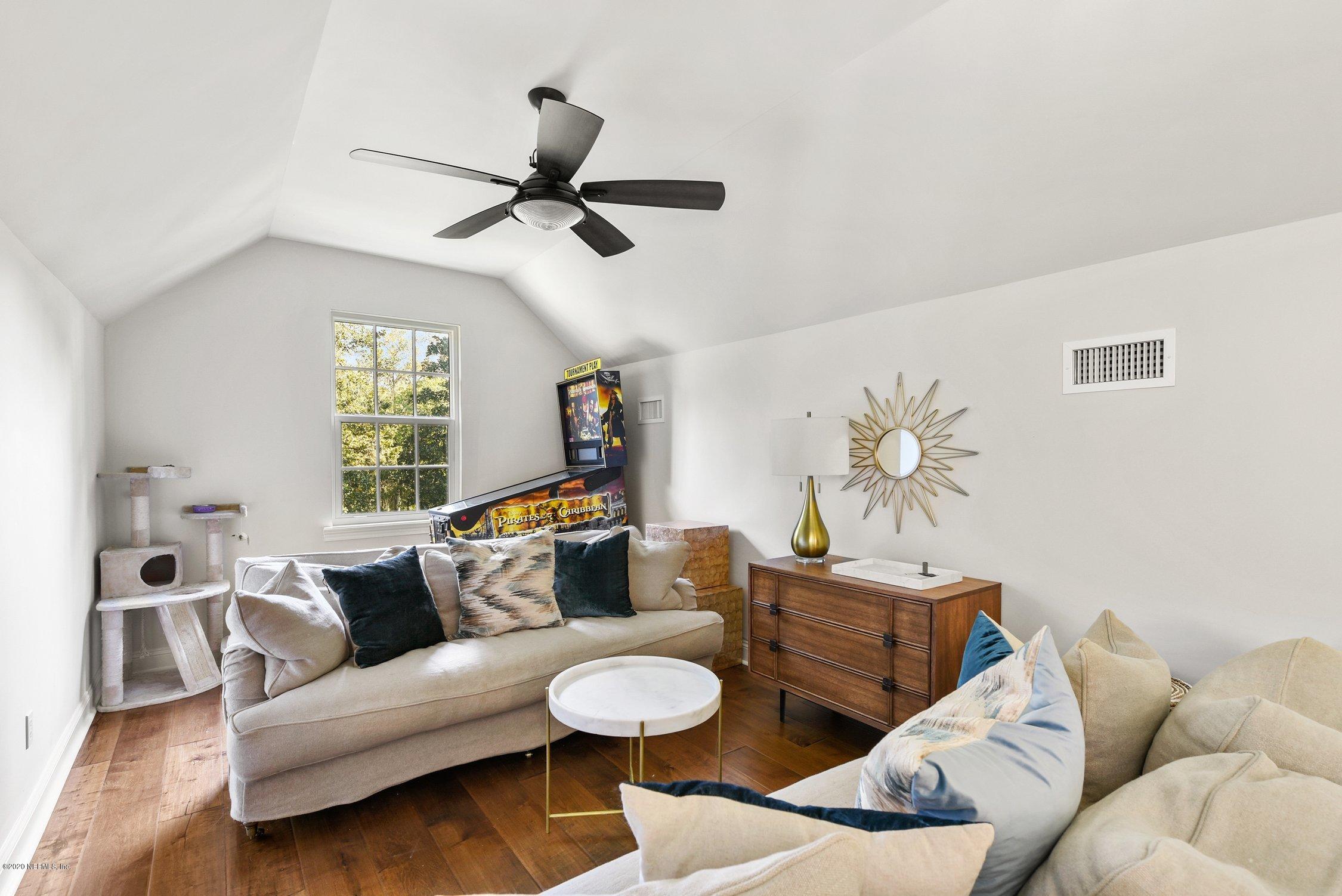 1217 Wedgewood Road Fruit Cove, FL 32259 - Photo 50 of 69 a living room with furniture and a window