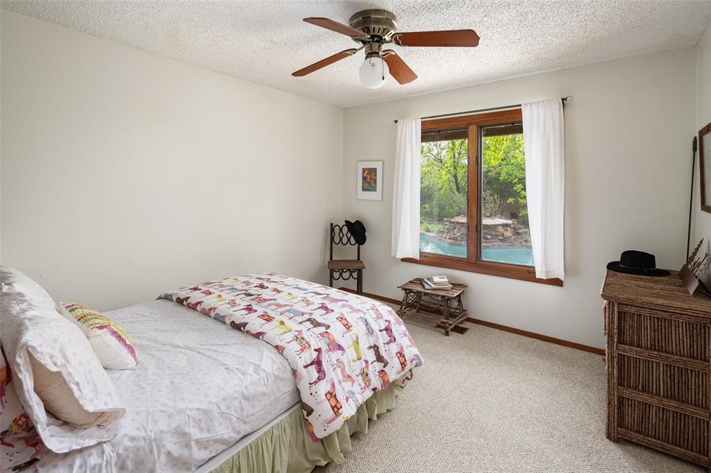 1251 Jim Cannon Road Van Alstyne, TX 75495 - Photo 13 of 31 a bedroom with a bed and a window