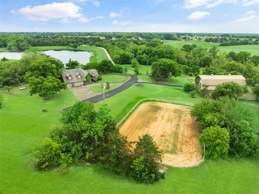1251 Jim Cannon Road Van Alstyne, TX 75495 - Photo 26 of 31 an aerial view of a golf course with outdoor space swimming pool and outdoor seating