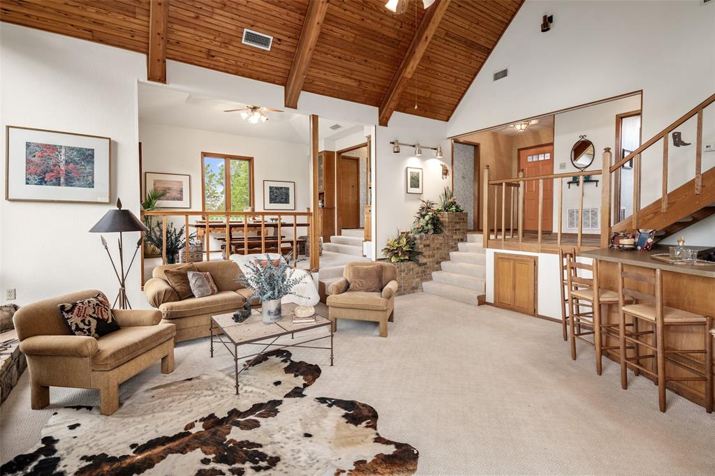 1251 Jim Cannon Road Van Alstyne, TX 75495 - Photo 5 of 31 a living room with furniture and a chandelier