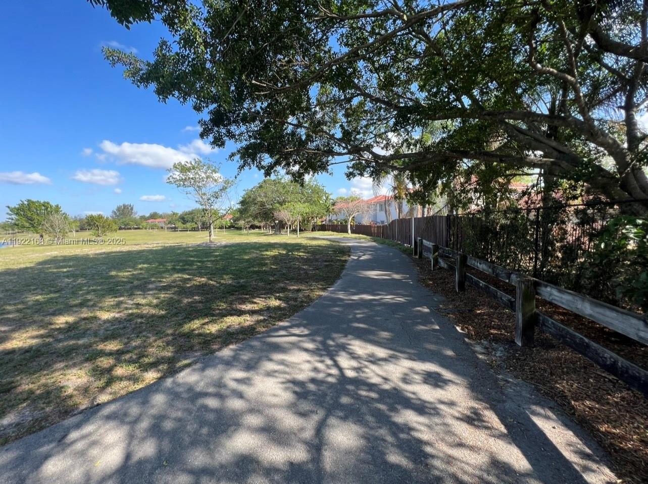 7317 Northwest 173rd Drive, Unit 104 Hialeah, FL 33015 - Photo 20 of 22 a view of an outdoor space with seating area